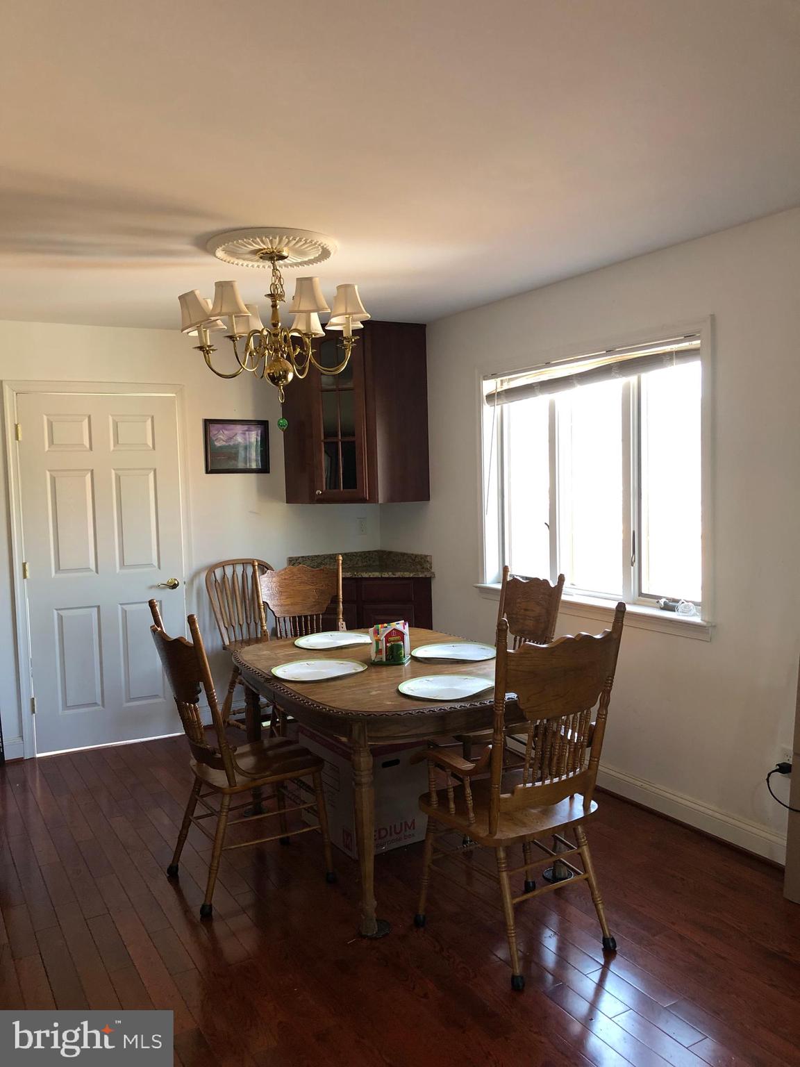 12550 Shoemaker Road Taneytown, MD 21787 - Photo 22 of 40 a view of a dining room with furniture window and wooden floor