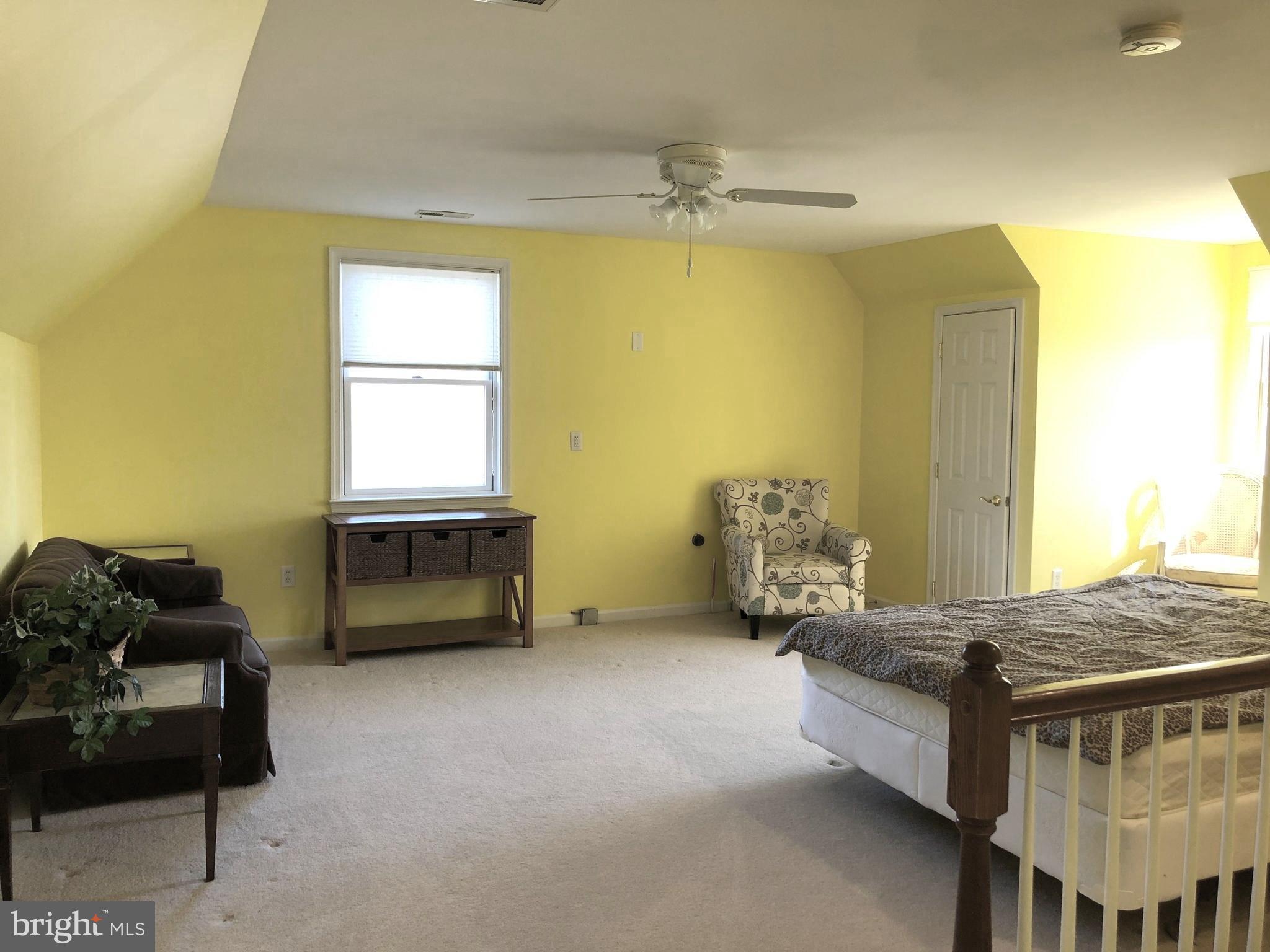 12550 Shoemaker Road Taneytown, MD 21787 - Photo 32 of 40 a bedroom with bed and window
