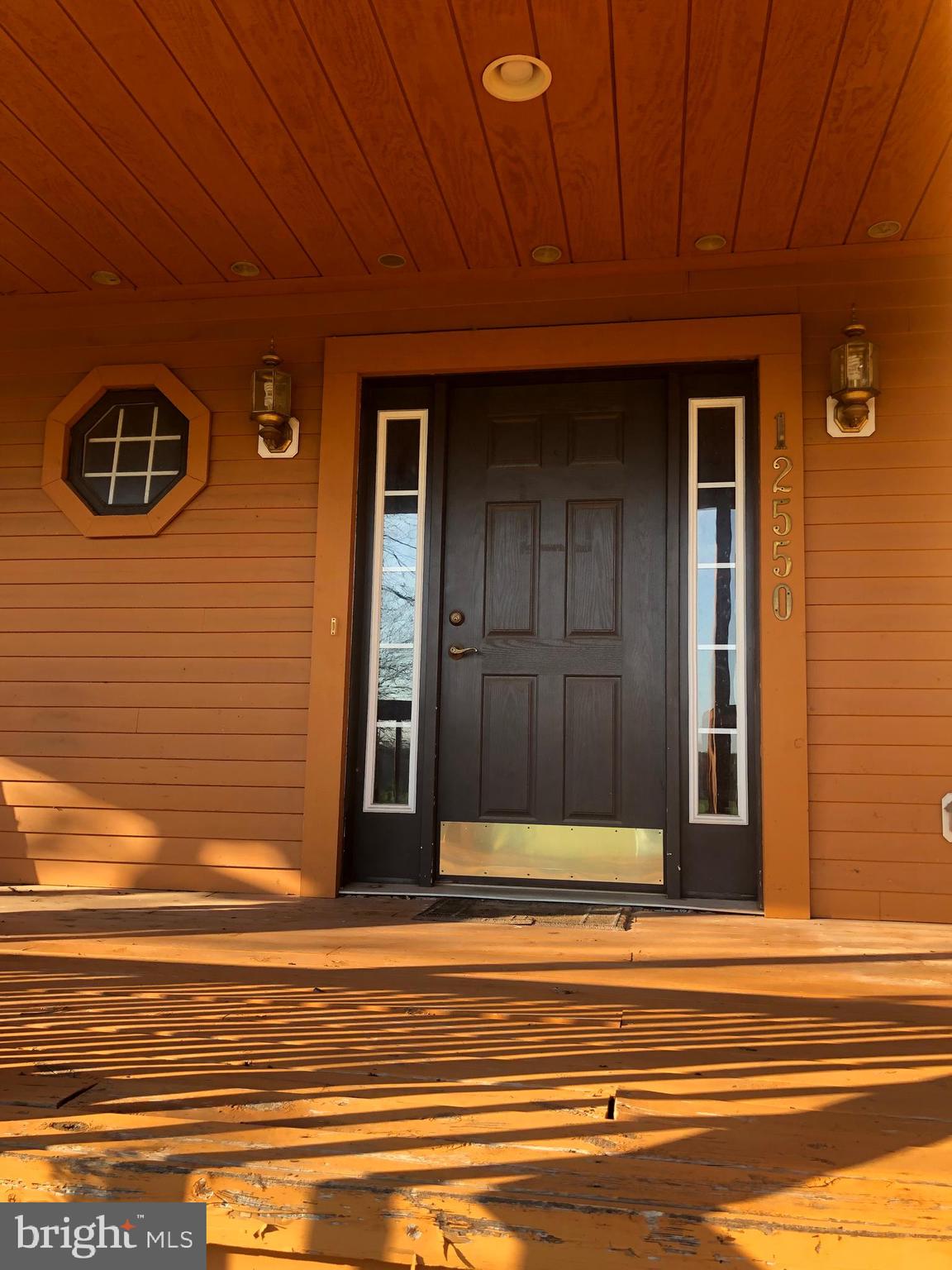 12550 Shoemaker Road Taneytown, MD 21787 - Photo 4 of 40 a view of a house with a door