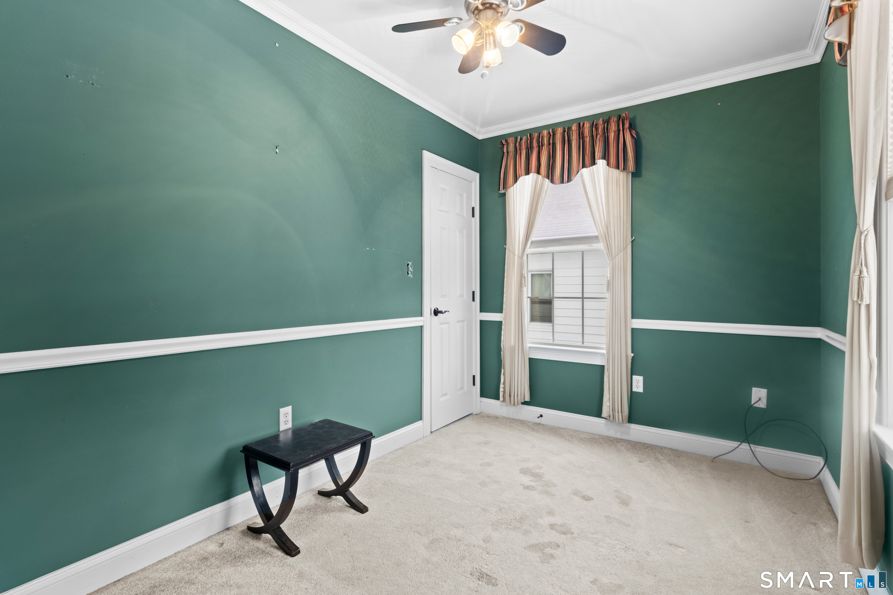 826 South Main Street Seymour, CT 06483 - Photo 16 of 27 a view of a workspace with furniture and a window