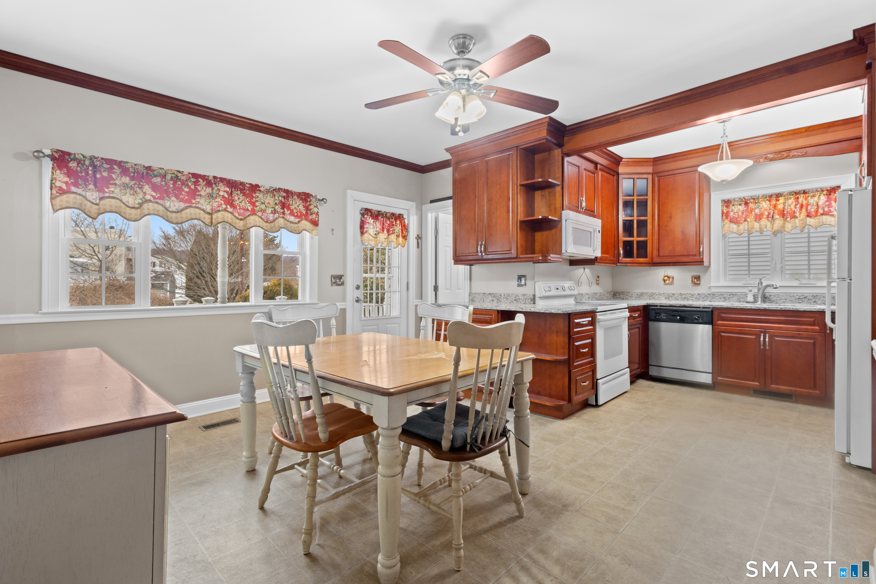 826 South Main Street Seymour, CT 06483 - Photo 4 of 27 a view of a dining room with furniture window and outside view