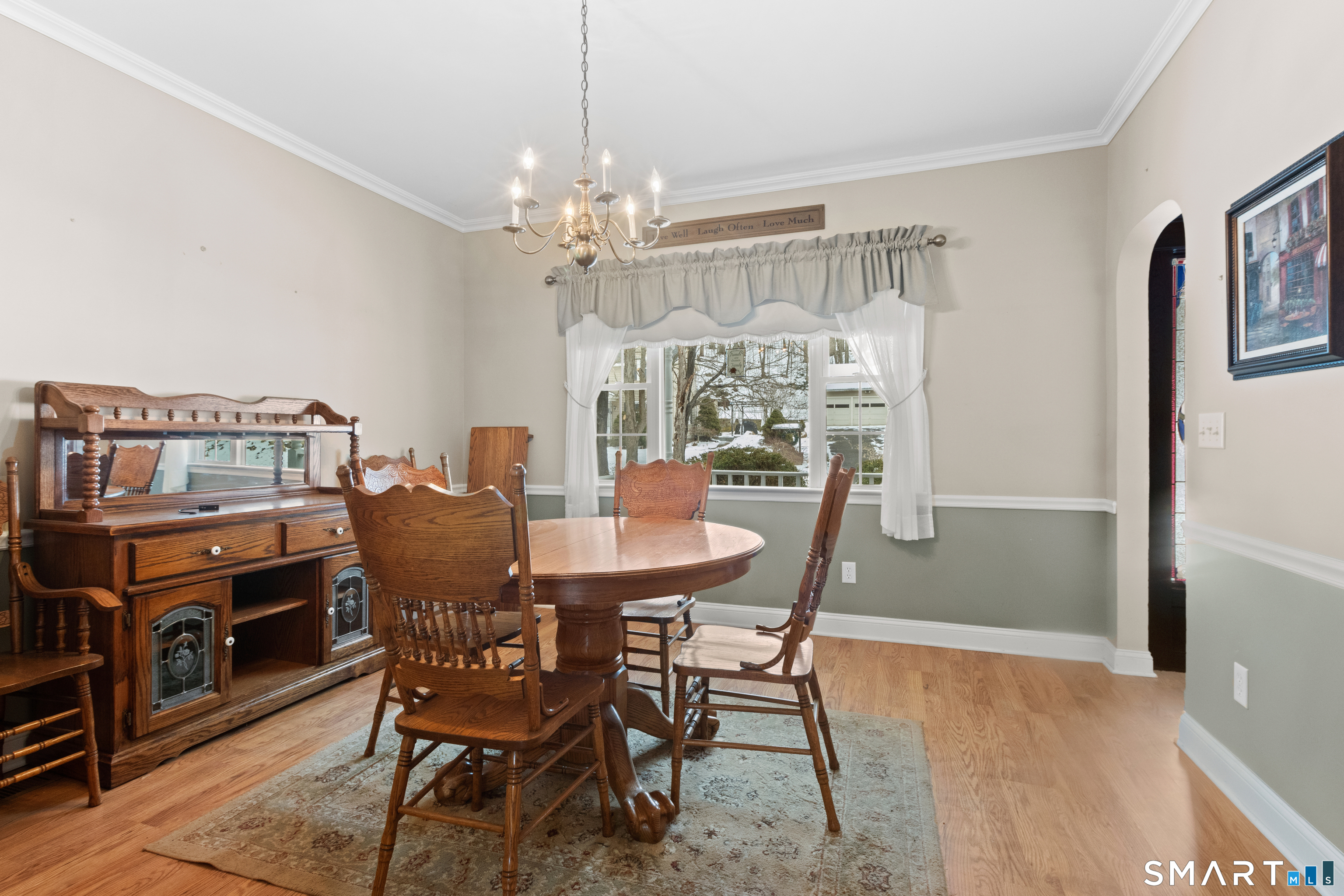 826 South Main Street Seymour, CT 06483 - Photo 8 of 27 a view of a dining room with furniture window and wooden floor