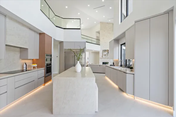 a work room with furniture and windows