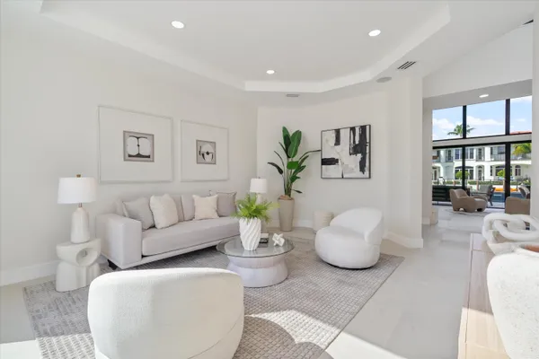a bedroom with bed and white walls