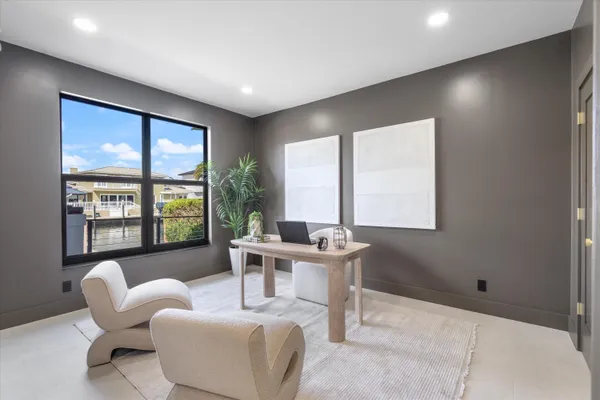 a bathroom with a sink a bathtub and shower