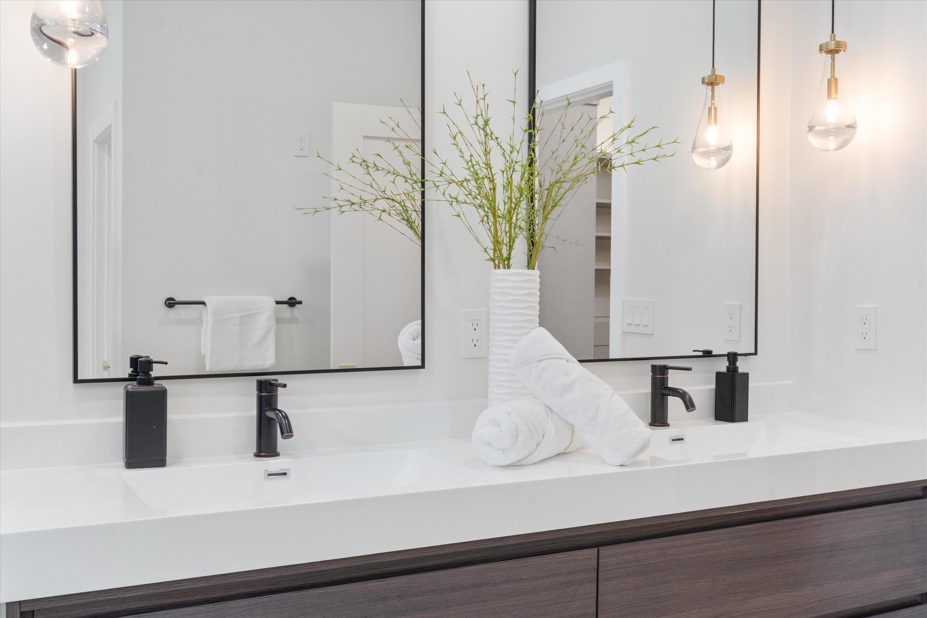 3721 Northeast 30th Avenue Lighthouse Point, FL 33064 - Photo 29 of 70 a bathroom with a sink and a mirror