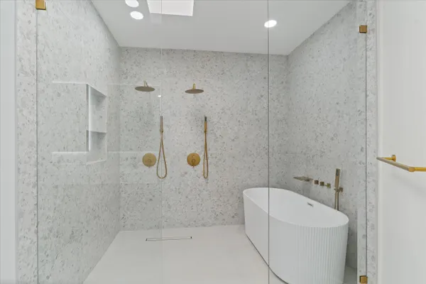 a view of a swimming pool with a patio and a garden