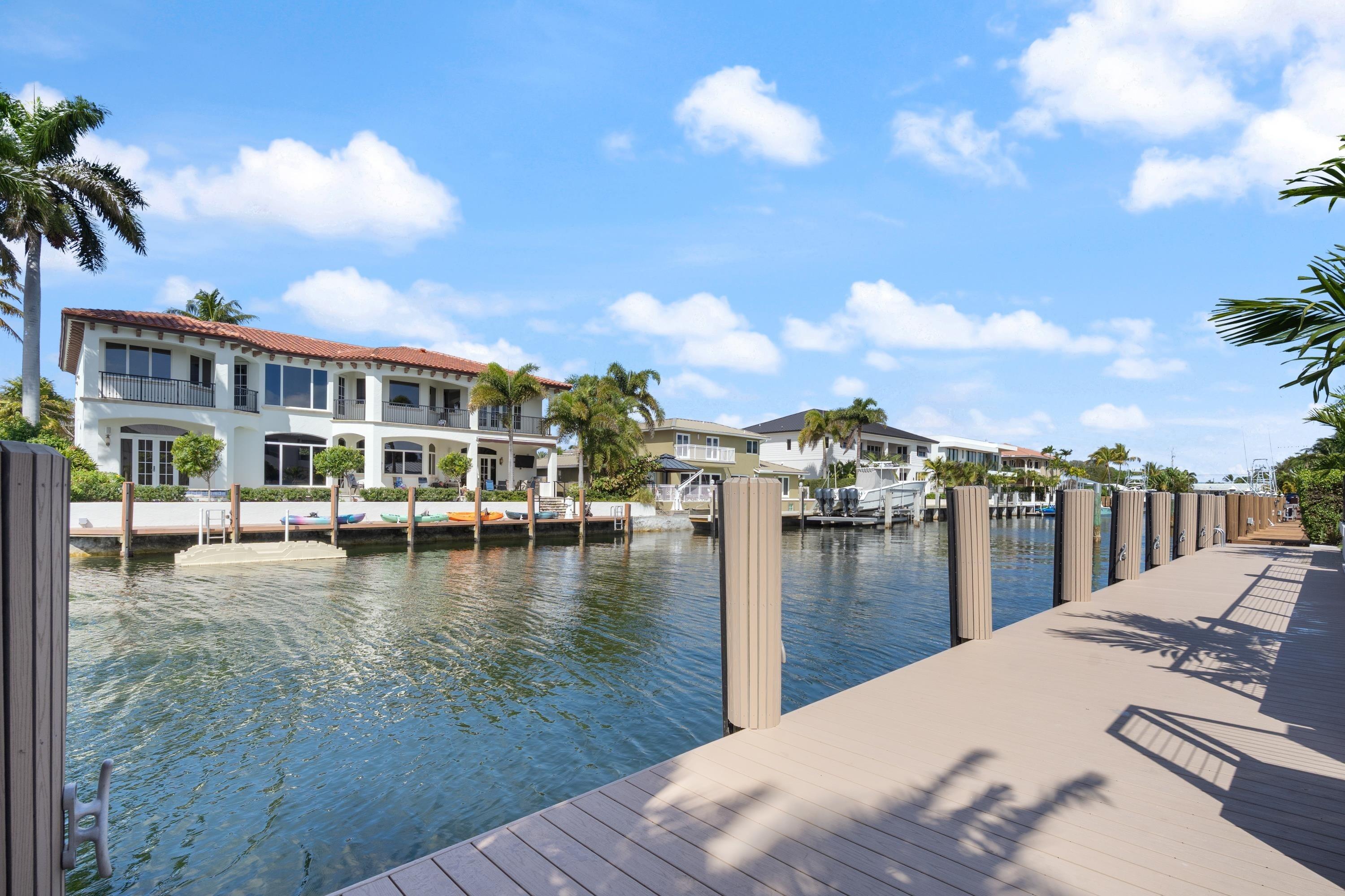 3721 Northeast 30th Avenue Lighthouse Point, FL 33064 - Photo 52 of 70 a view of a lake with houses