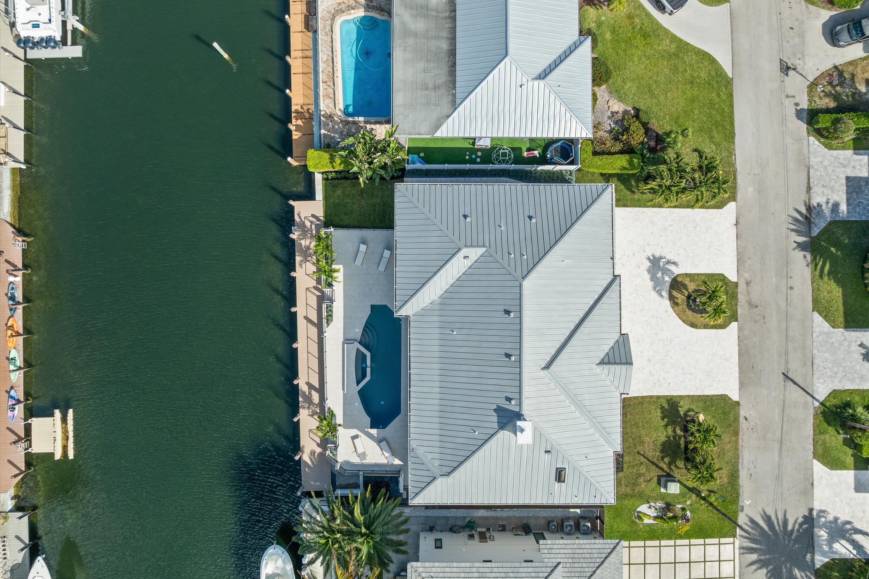 3721 Northeast 30th Avenue Lighthouse Point, FL 33064 - Photo 54 of 70 an aerial view of houses with outdoor space