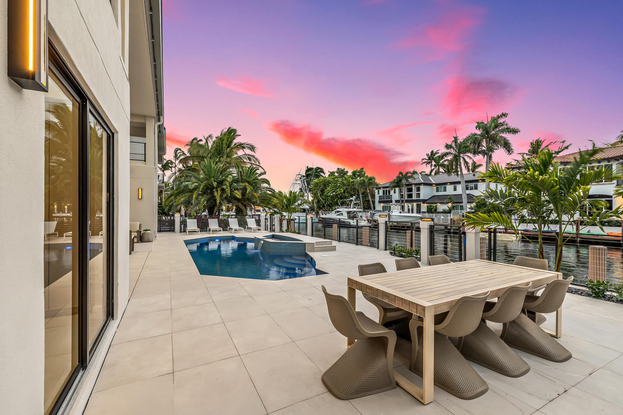 3721 Northeast 30th Avenue Lighthouse Point, FL 33064 - Photo 66 of 70 a view of a chairs and table in patio
