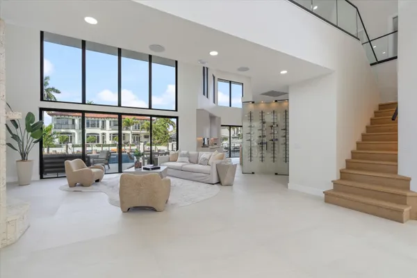 a kitchen with a refrigerator and a sink