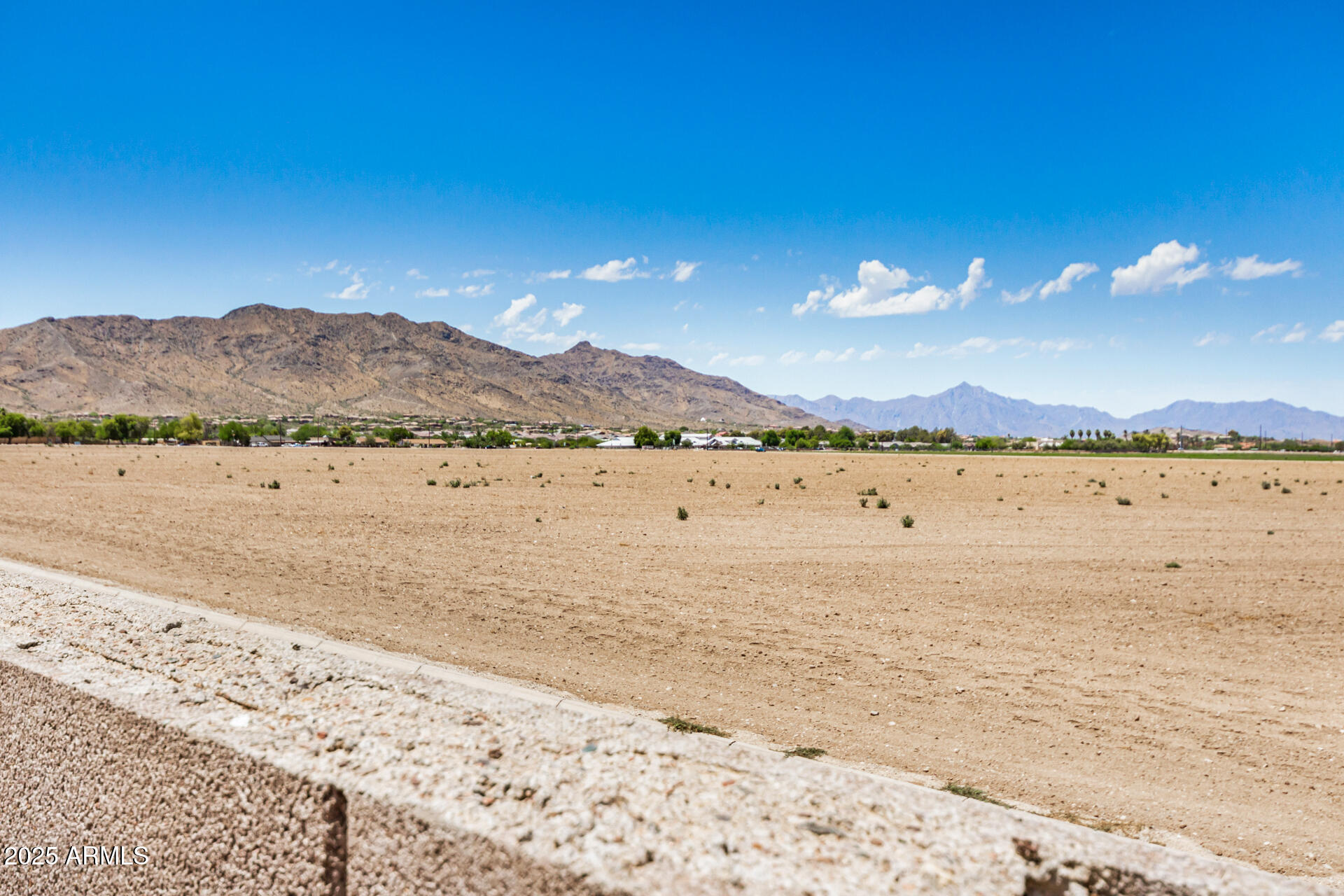 8632 South 10th Lane Phoenix, AZ 85041 - Photo 29 of 31 a view of an ocean with a mountain view