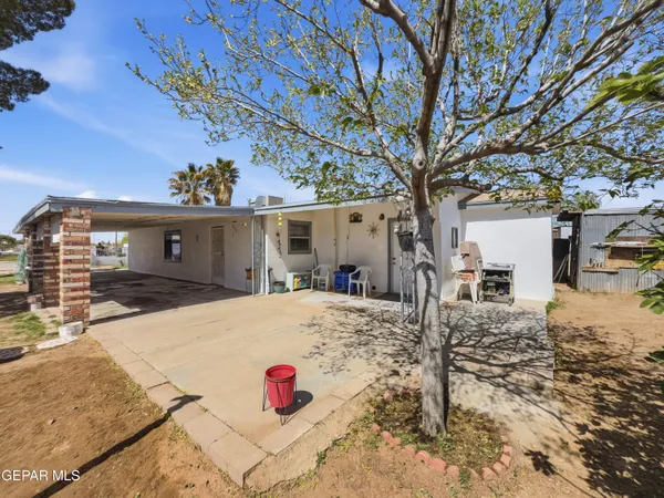 a view of a couches in front of house