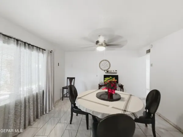 a view of a dining room and a table in a room