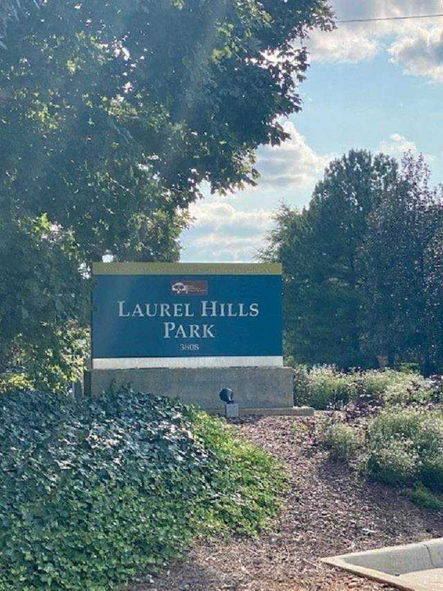 3925 Milltown Ridge Run Raleigh, NC 27612 - Photo 13 of 17 a view of outdoor space with signage and flags