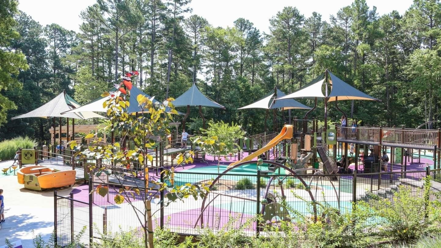 3925 Milltown Ridge Run Raleigh, NC 27612 - Photo 14 of 17 a roof deck with table and chairs under an umbrella