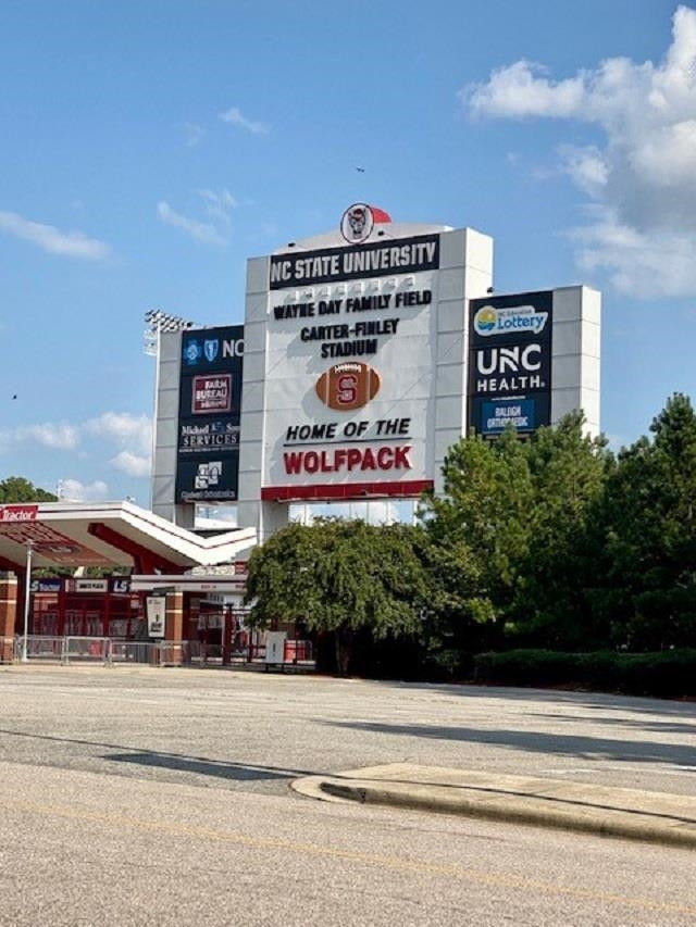3925 Milltown Ridge Run Raleigh, NC 27612 - Photo 16 of 17 a sign on the side of a building