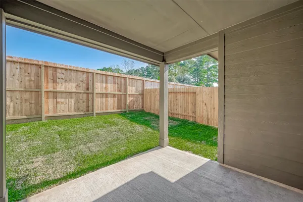 a view of a backyard with a garden