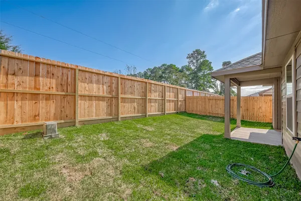 a view of a backyard with a garden