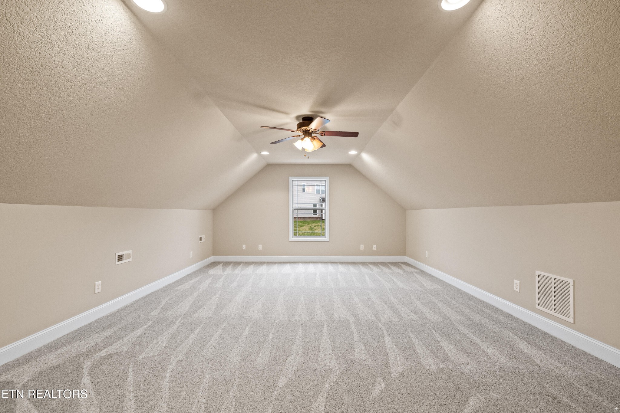 6101 Pembridge Road Knoxville, TN 37912 - Photo 21 of 29 wooden floor in an empty room with a window