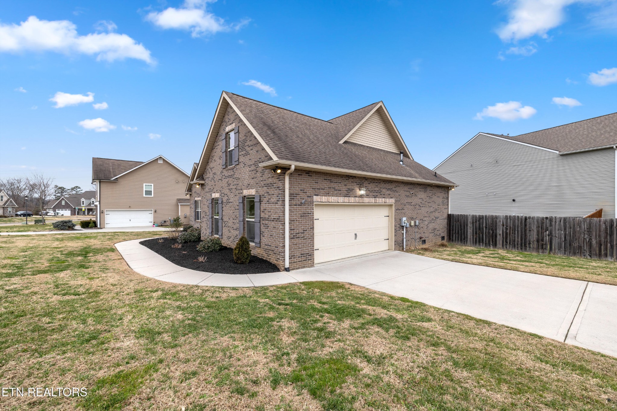 6101 Pembridge Road Knoxville, TN 37912 - Photo 28 of 29 a front view of a house with a yard