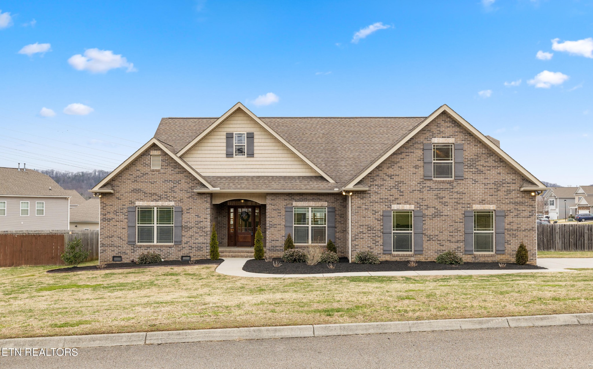6101 Pembridge Road Knoxville, TN 37912 - Photo 29 of 29 a front view of a house with a yard outdoor seating and garage