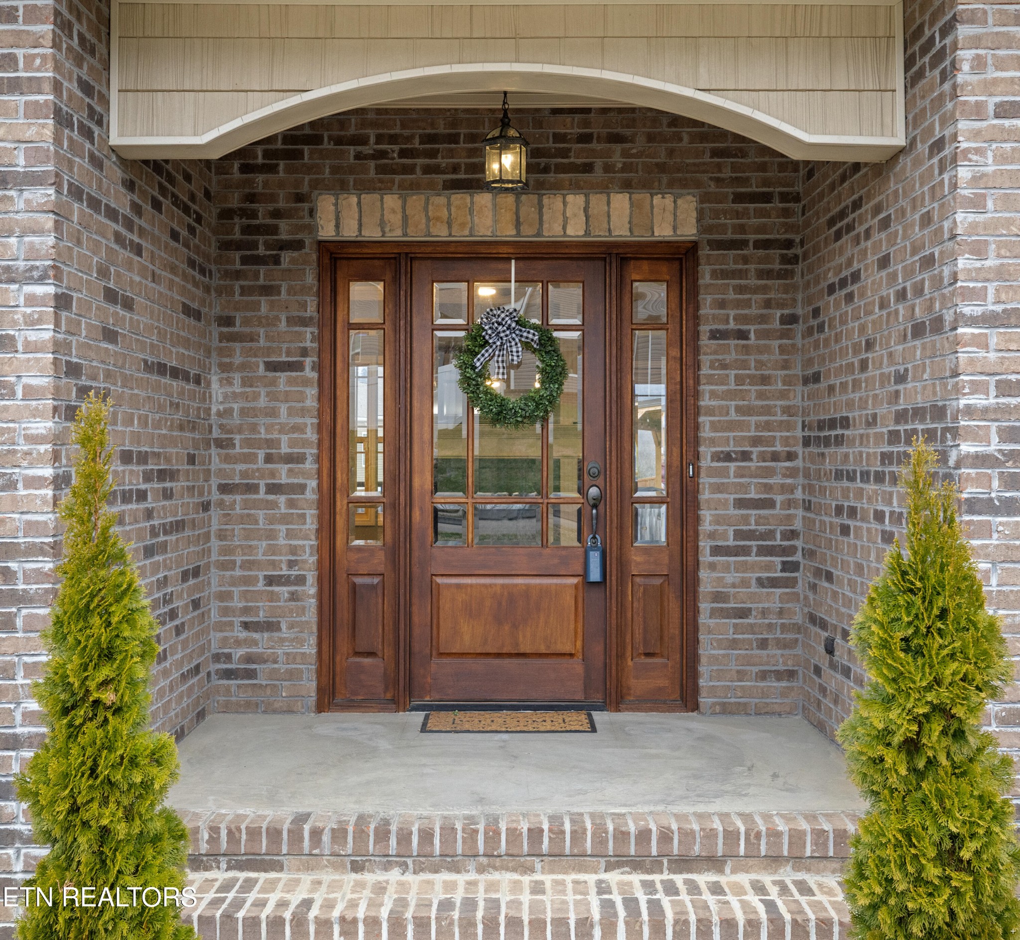 6101 Pembridge Road Knoxville, TN 37912 - Photo 3 of 29 a front view of a house with a glass door