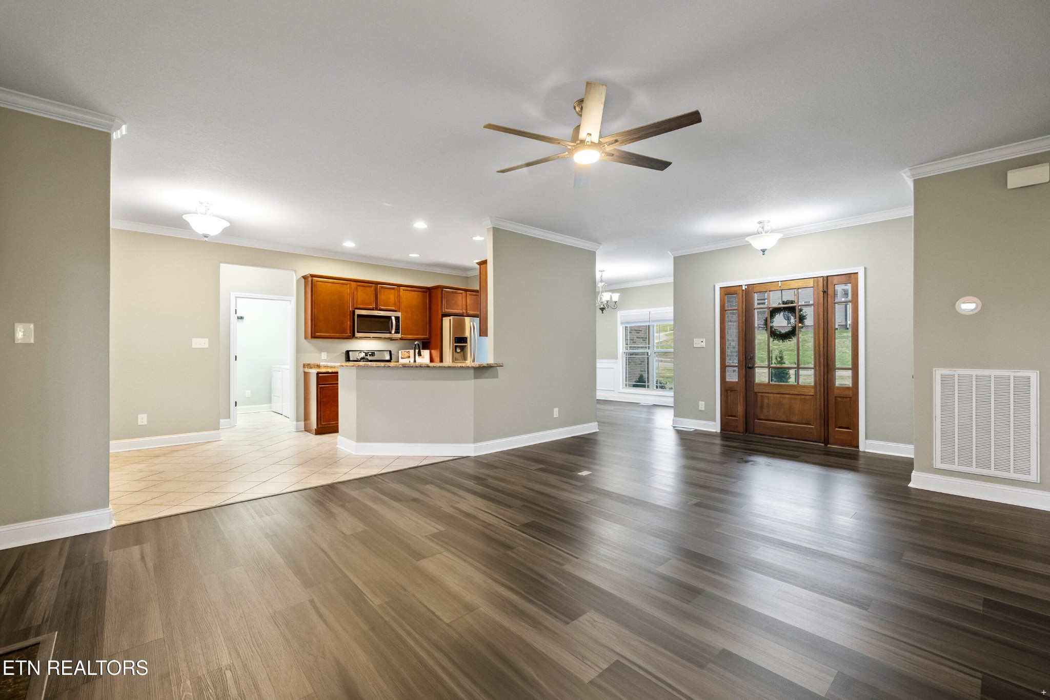6101 Pembridge Road Knoxville, TN 37912 - Photo 5 of 29 a view of an empty room and wooden floor
