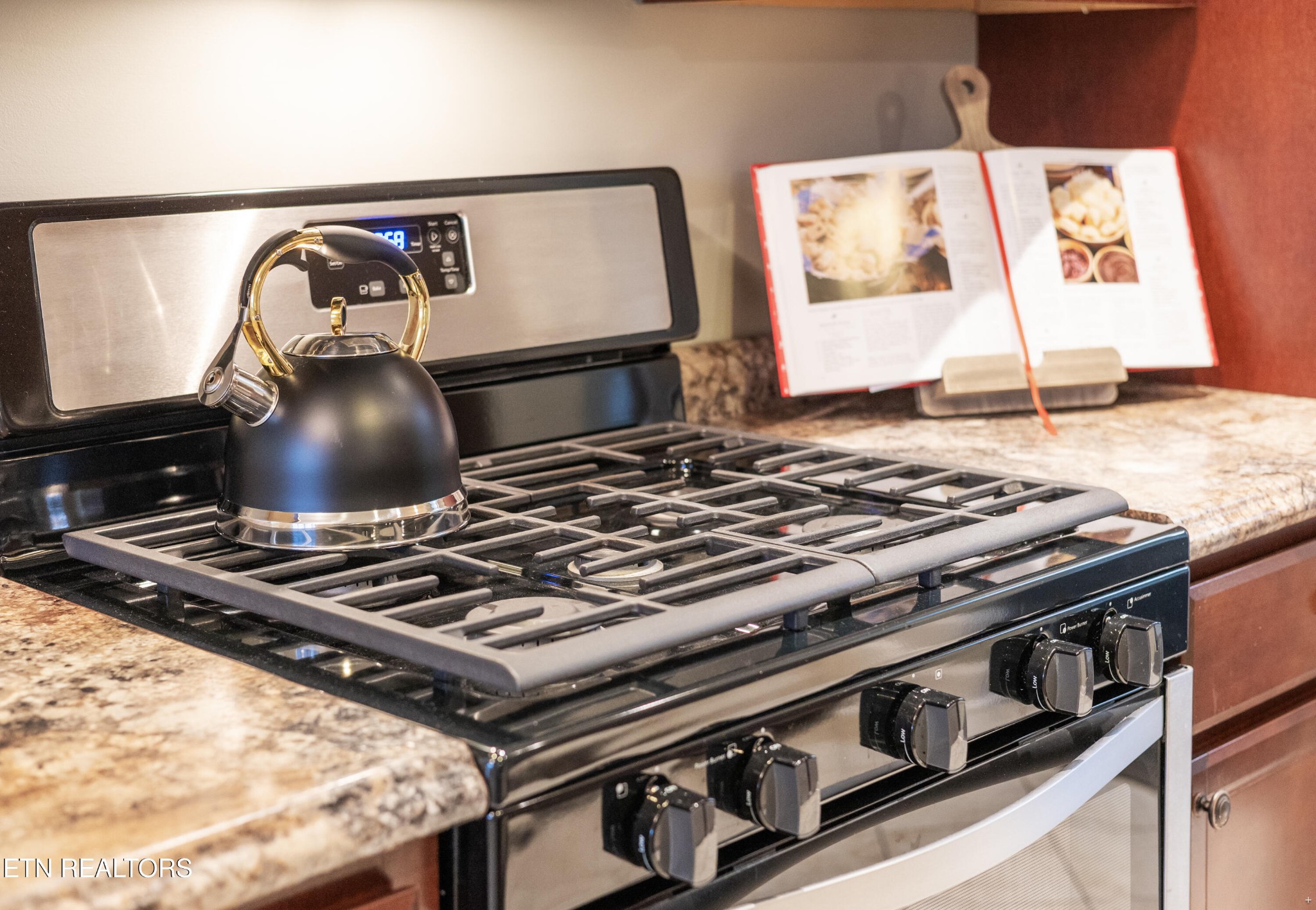 6101 Pembridge Road Knoxville, TN 37912 - Photo 8 of 29 a black and white stove sitting inside of a kitchen