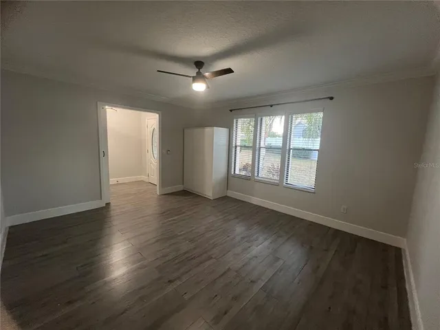a bathroom with a toilet a sink and bathtub
