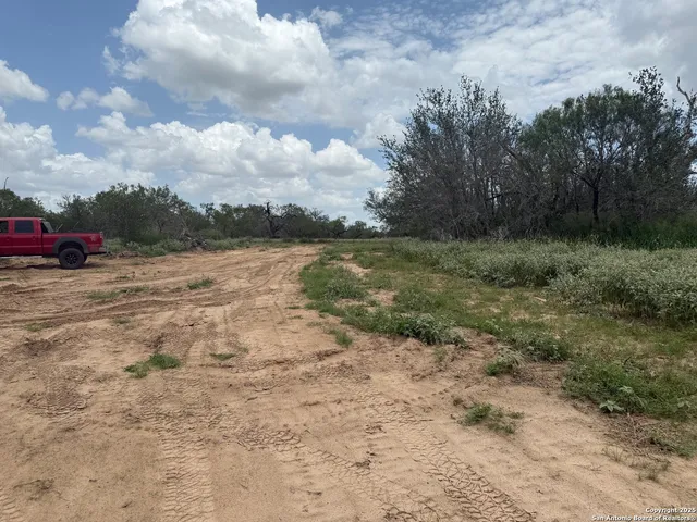 a view of a road with an ocean view