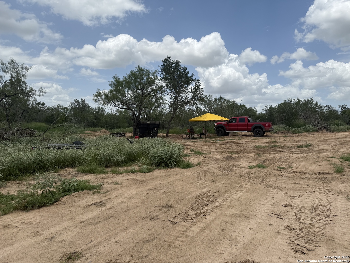 Tbd Fm 476 Poteet, TX 78065 - Photo 17 of 22 a view of yard with outdoor seating and barbeque oven