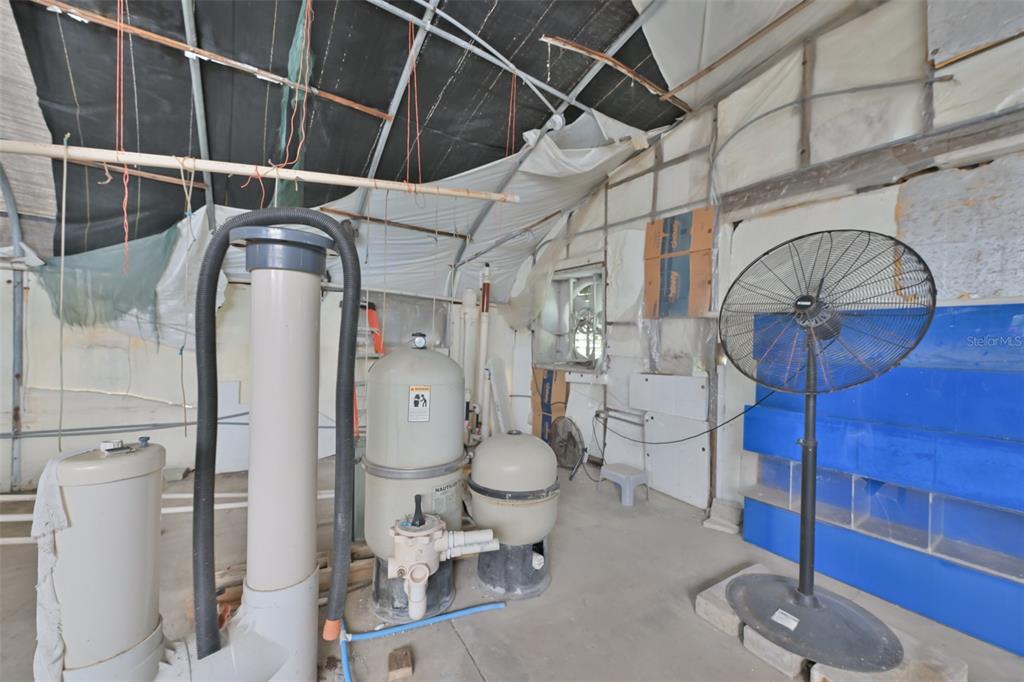 14451 Highland Road Wimauma, FL 33598 - Photo 32 of 80 a utility room with dryer and washer