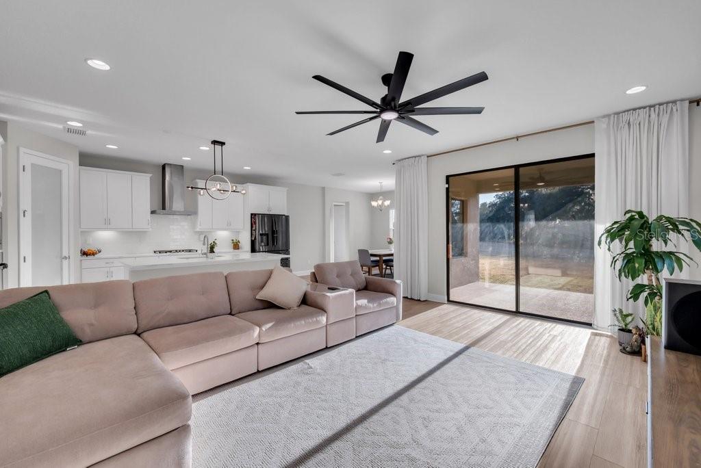 14604 Horse Trot Road Lithia, FL 33547 - Photo 12 of 62 a living room with furniture and a large window