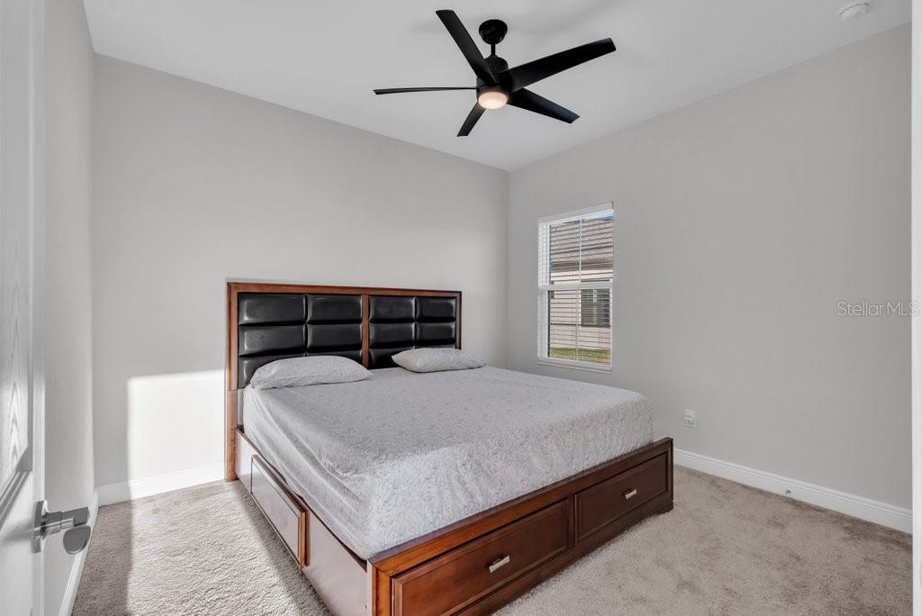 14604 Horse Trot Road Lithia, FL 33547 - Photo 20 of 62 a bedroom with a bed and window