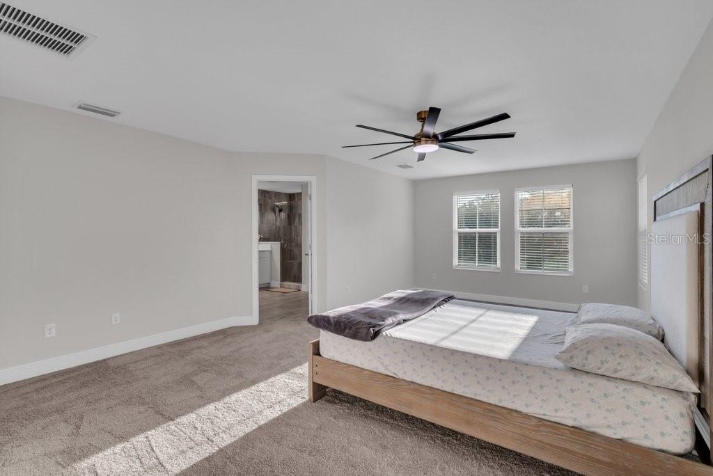 14604 Horse Trot Road Lithia, FL 33547 - Photo 27 of 62 a bedroom with a bed and window