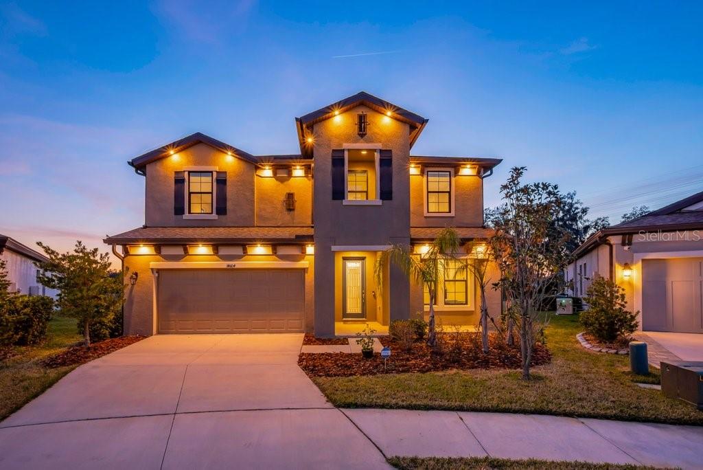 14604 Horse Trot Road Lithia, FL 33547 - Photo 42 of 62 a front view of a house with yard