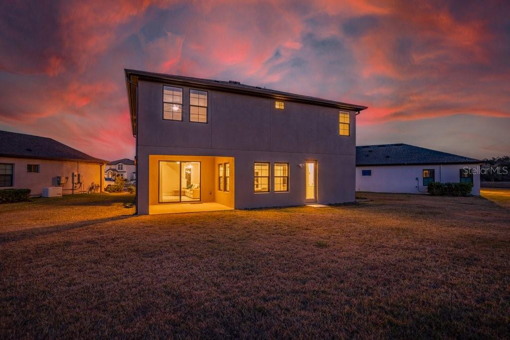 14604 Horse Trot Road Lithia, FL 33547 - Photo 46 of 62 a front view of a house with a yard