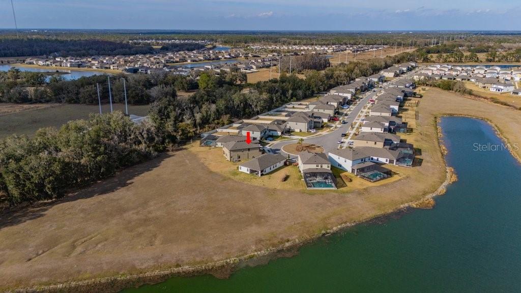 14604 Horse Trot Road Lithia, FL 33547 - Photo 53 of 62 an aerial view of a house with a garden