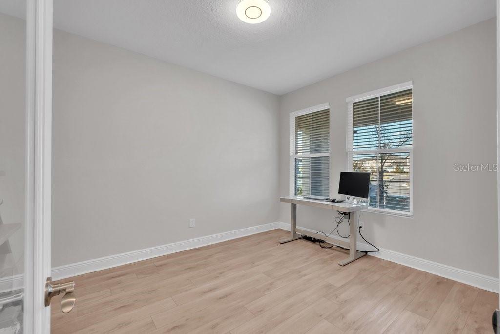 14604 Horse Trot Road Lithia, FL 33547 - Photo 7 of 62 a view of a workspace with furniture and a window