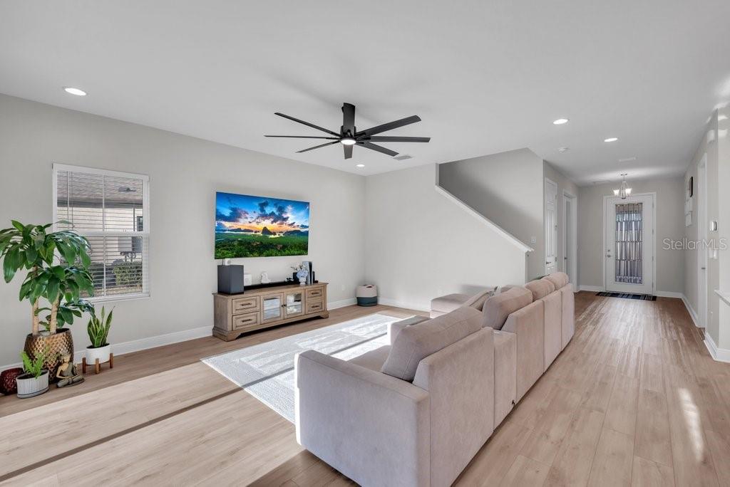 14604 Horse Trot Road Lithia, FL 33547 - Photo 10 of 62 a living room with furniture and a flat screen tv