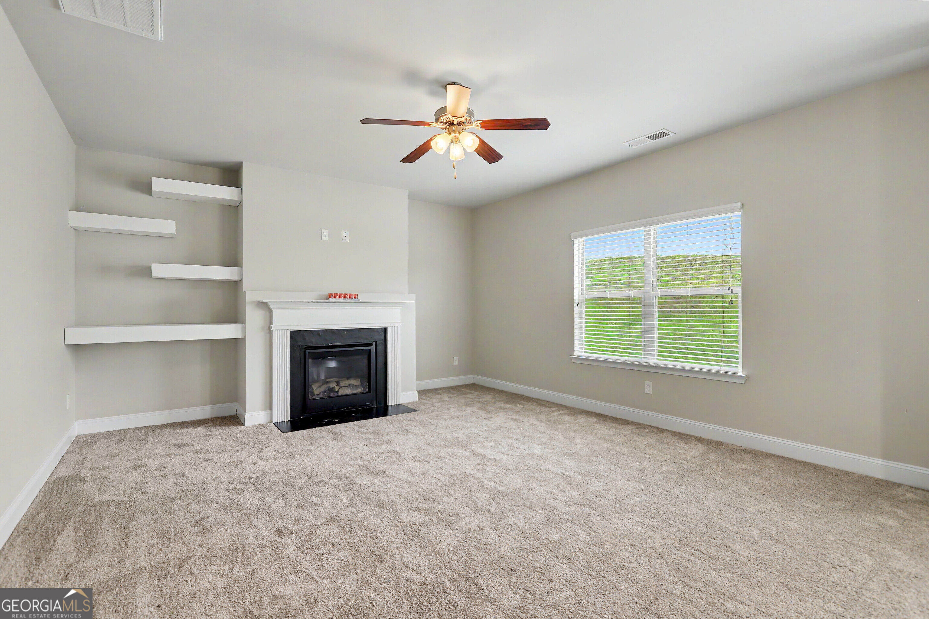 3482 Hancock View Decatur, GA 30034 - Photo 19 of 44 Living Room with Fireplace and built in Shelves