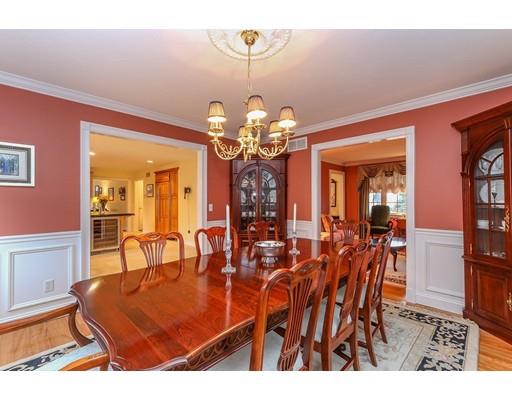7 Rose Road Millis, MA 02054 - Photo 11 of 28 a view of a dining room with furniture and chandelier