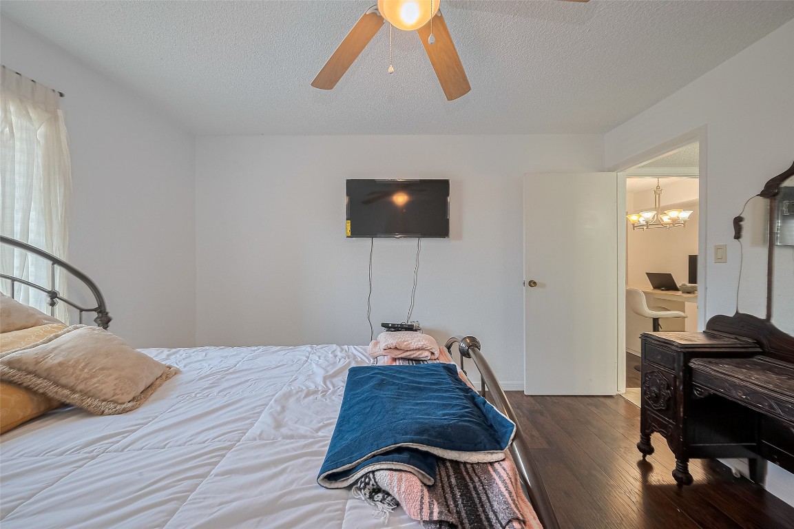 1505 Ward Road, Unit 118 Baytown, TX 77520 - Photo 28 of 35 a bedroom with a bed and a flat screen tv