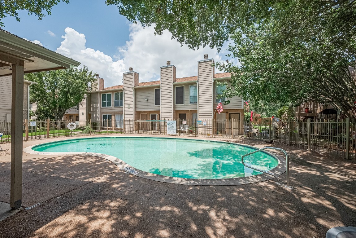 1505 Ward Road, Unit 118 Baytown, TX 77520 - Photo 31 of 35 front view of a house with a yard