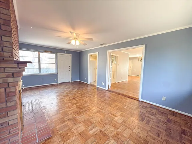 a view of an empty room and window