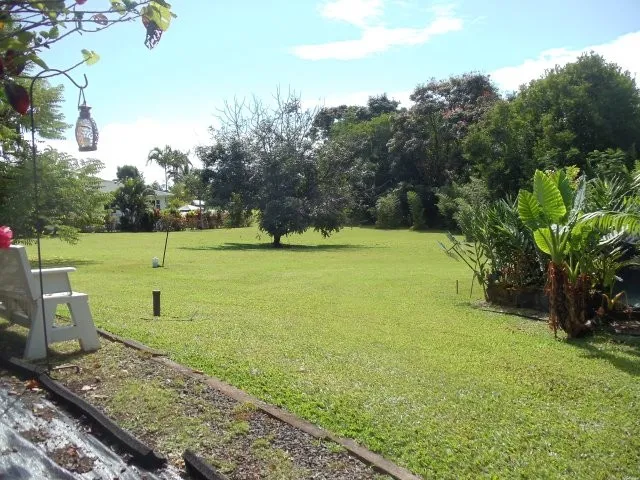 a view of a room with furniture and a window