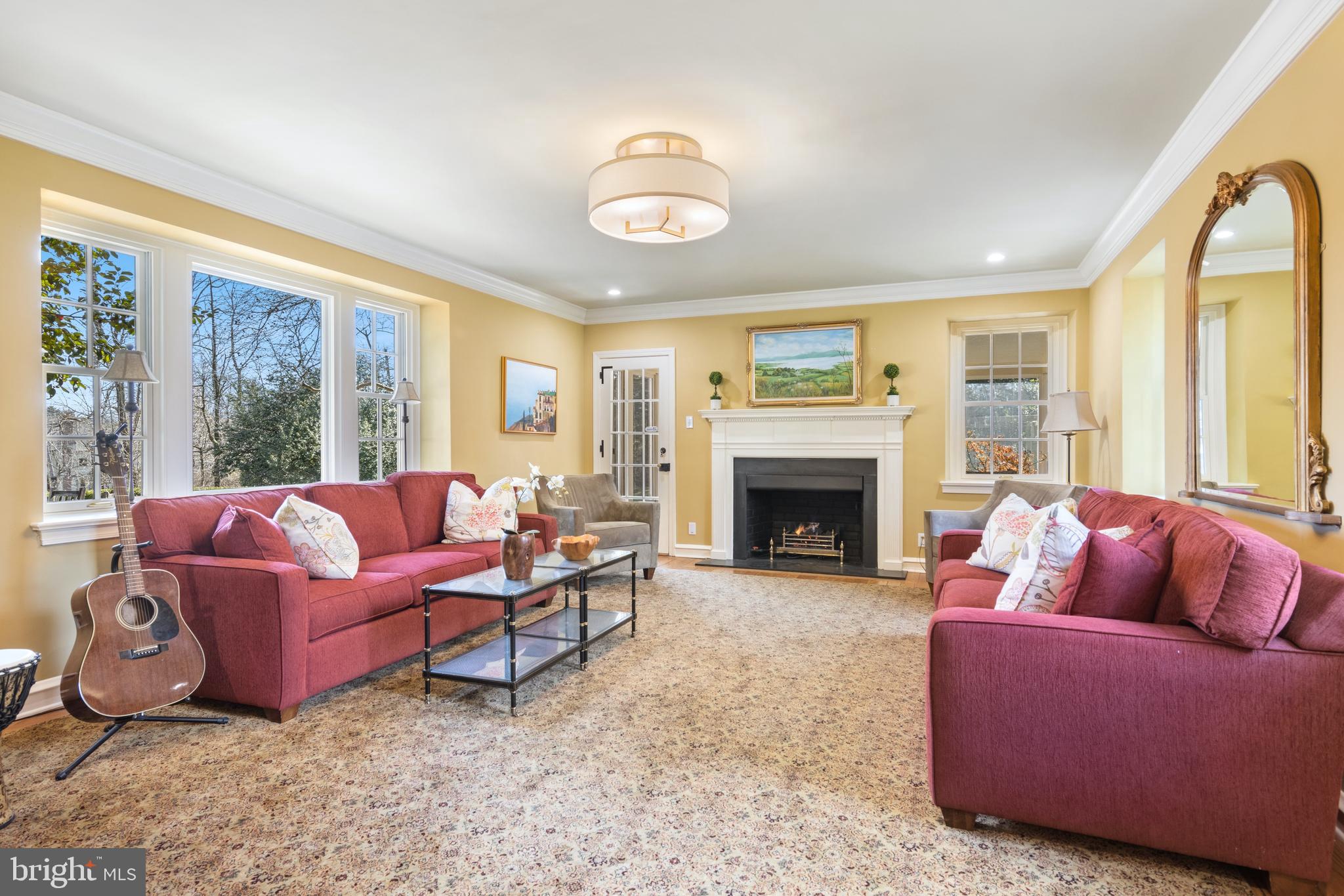 726 Cedar Lane Villanova, PA 19085 - Photo 9 of 62 gas fireplace, both sides have windows