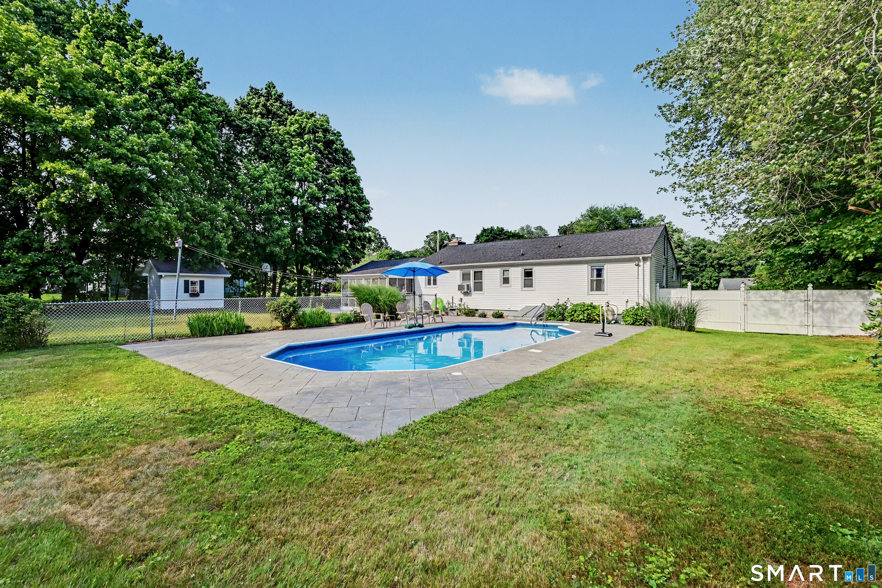 524 Ferry Road Orange, CT 06477 - Photo 3 of 40 a view of a house with a swimming pool