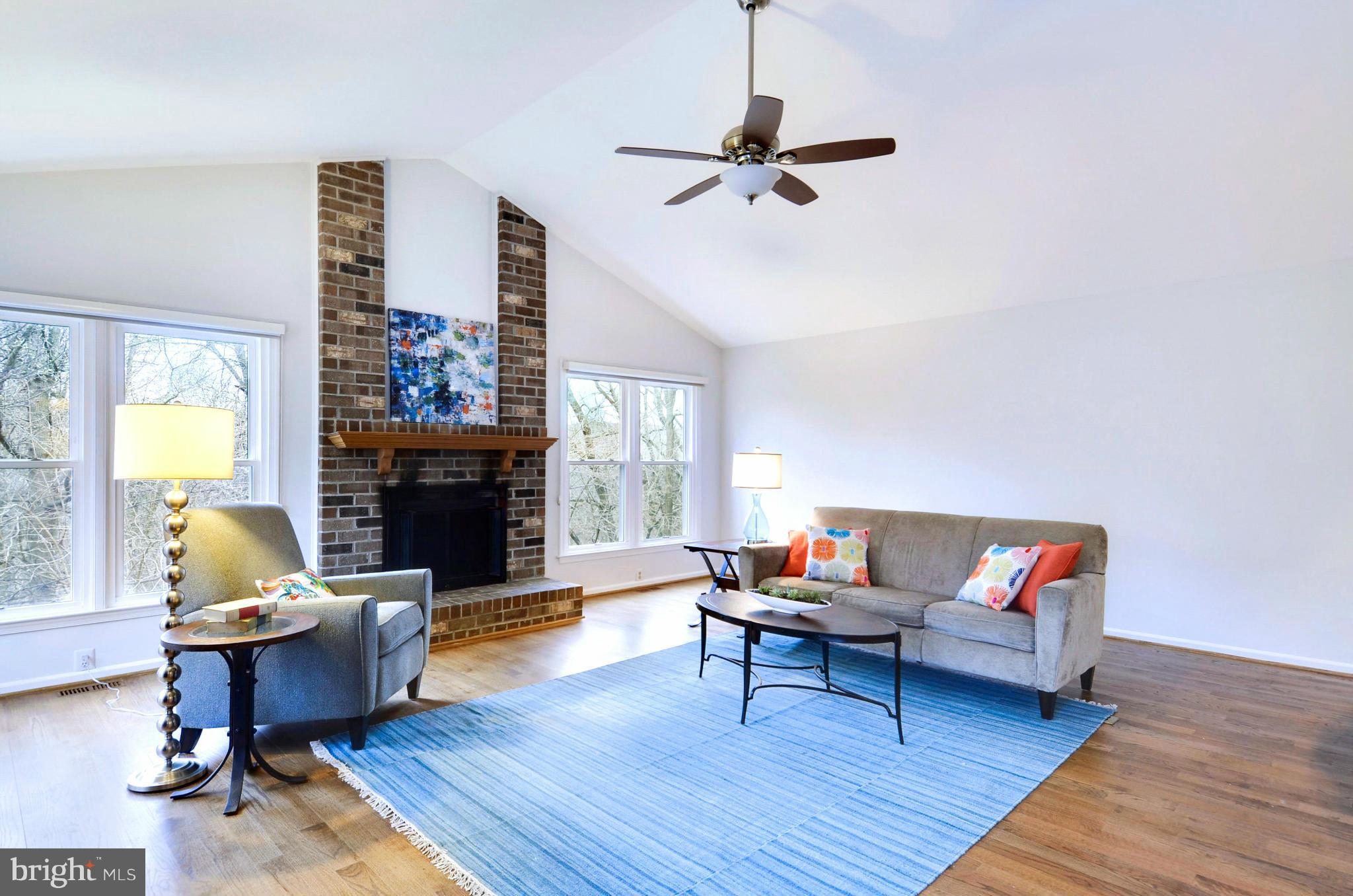 10848 Game Preserve Road Gaithersburg, MD 20879 - Photo 12 of 30 HUGE Family Room with a Brick Fireplace